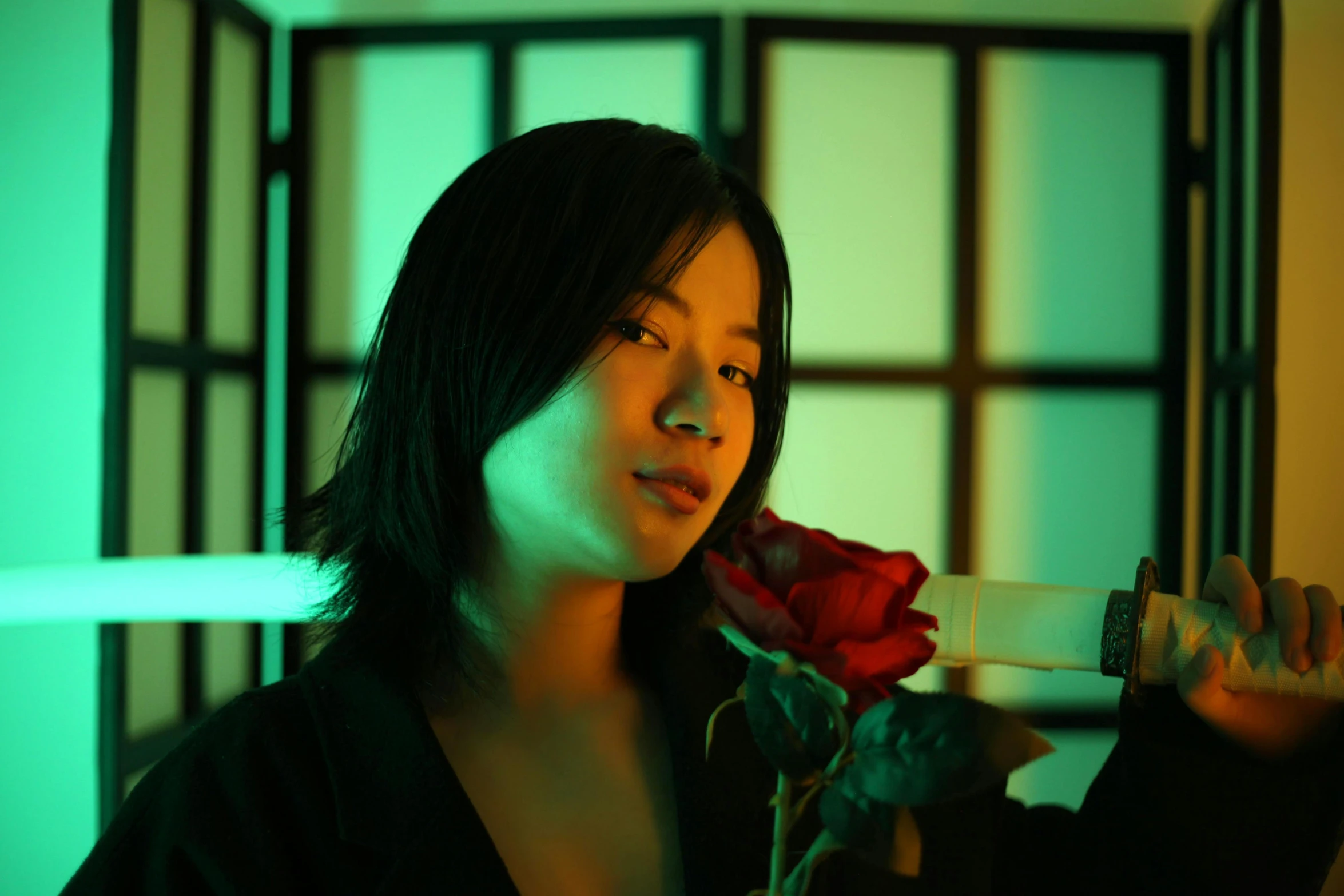 a woman holding a rose in one hand and a bottle in the other, an album cover, inspired by Itō Shinsui, pexels contest winner, underexposed lighting, half asian, light room, perfectly lit. movie still