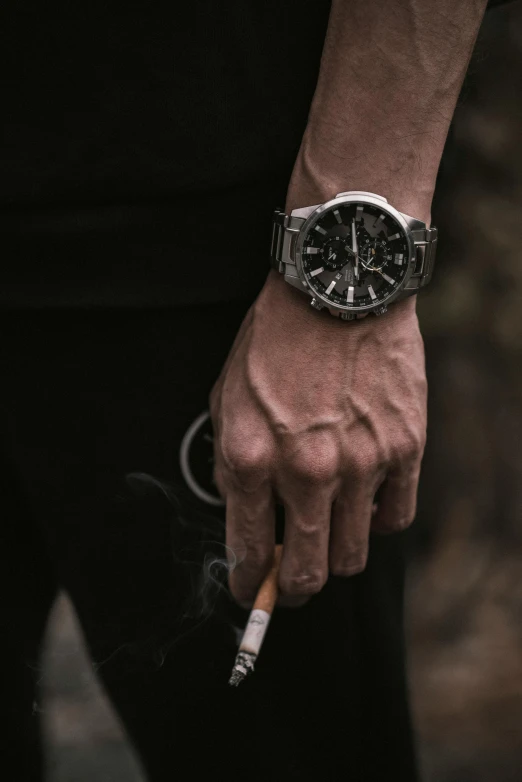 a man holding a cigarette and a watch, a charcoal drawing, trending on pexels, techwear clothes, silver sports watch, game ready, high textured