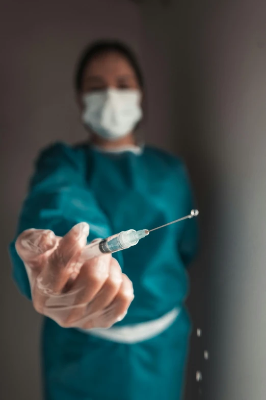 a nurse holding a syet in her hand, a picture, shutterstock, happening, needles, inside an epic, covid, implants