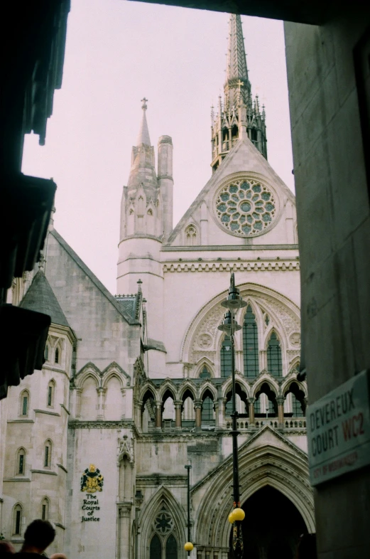 a couple of people that are standing in front of a building, royal court, viewed from a distance, buttresses, justice