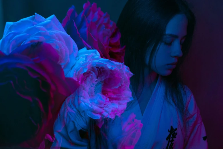 a woman holding a bouquet of flowers in a dark room, an album cover, pexels contest winner, art photography, ross tran and ilya kuvshinov, red and blue neon, teamlab, pale and coloured kimono