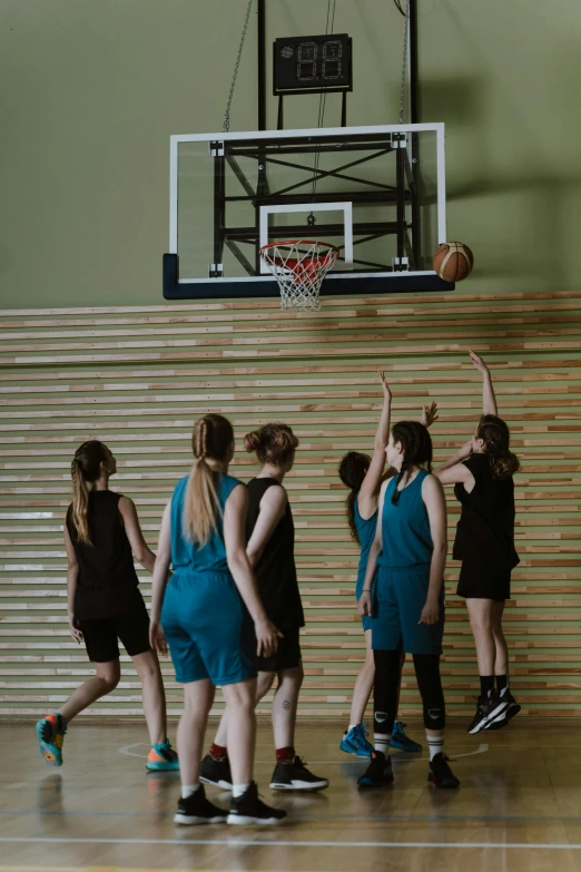 a group of young women playing a game of basketball, 15081959 21121991 01012000 4k, low quality photo, high textured, lena oxton