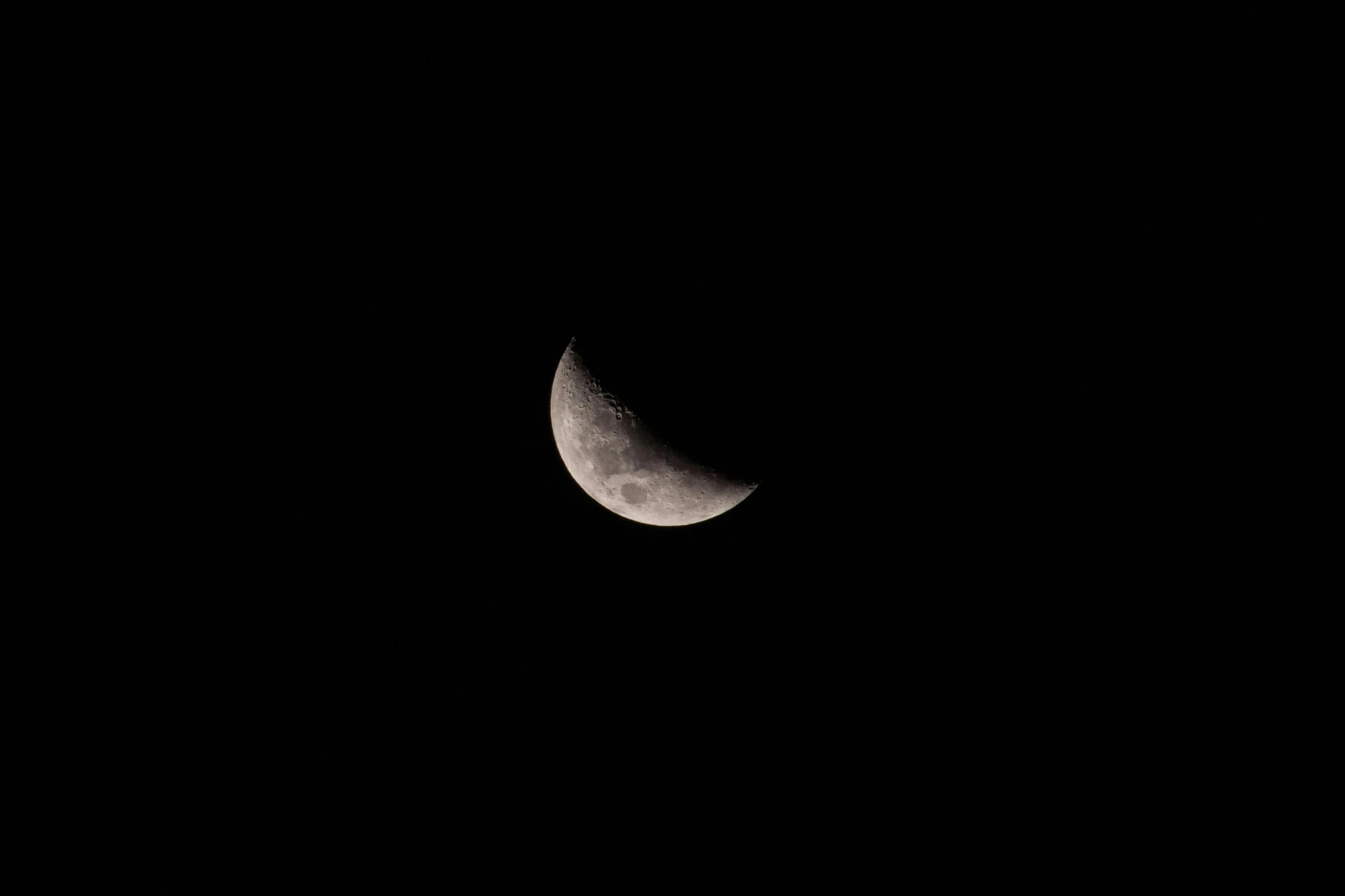 a half moon is seen in the dark sky, a picture, pexels, sickle, highly detailed # no filter, digital image, stacked image