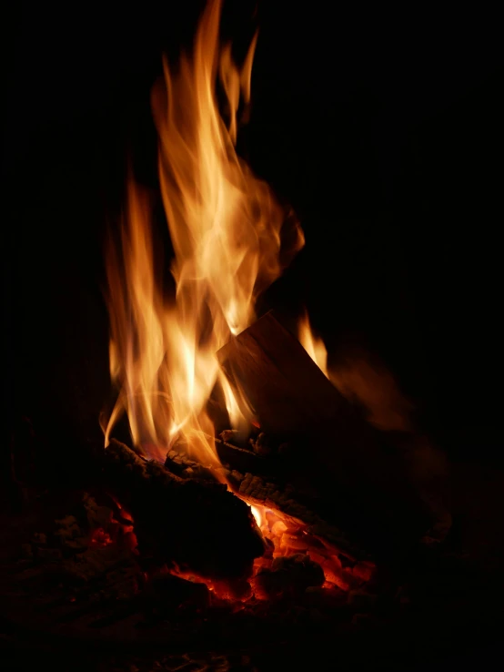 a close up of a fire in the dark, profile image, campfire in background, multiple stories, profile pic