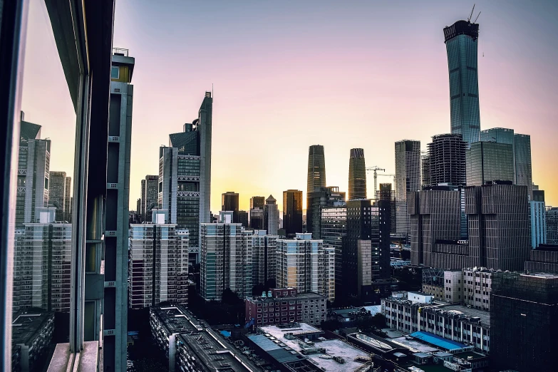 a view of a city from a high rise building, inspired by Cheng Jiasui, pexels contest winner, album cover, early evening, hyperdetailed, chinese architecture