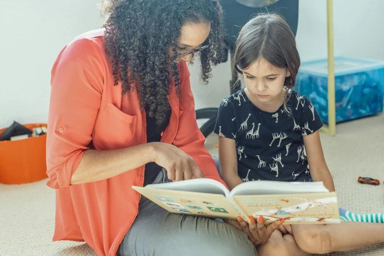 a woman reading a book to a little girl, pexels contest winner, 15081959 21121991 01012000 4k, instagram post, teacher, in a medium full shot