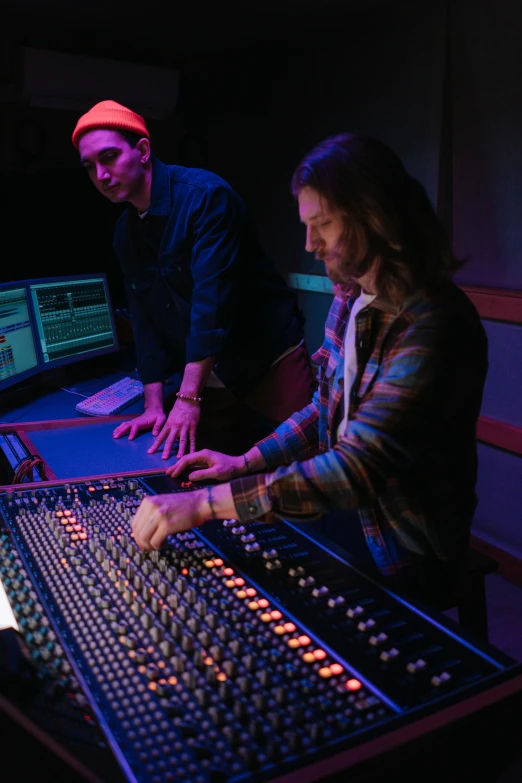 a man and a woman in a recording studio, calarts, color grading, promo image, garner holt