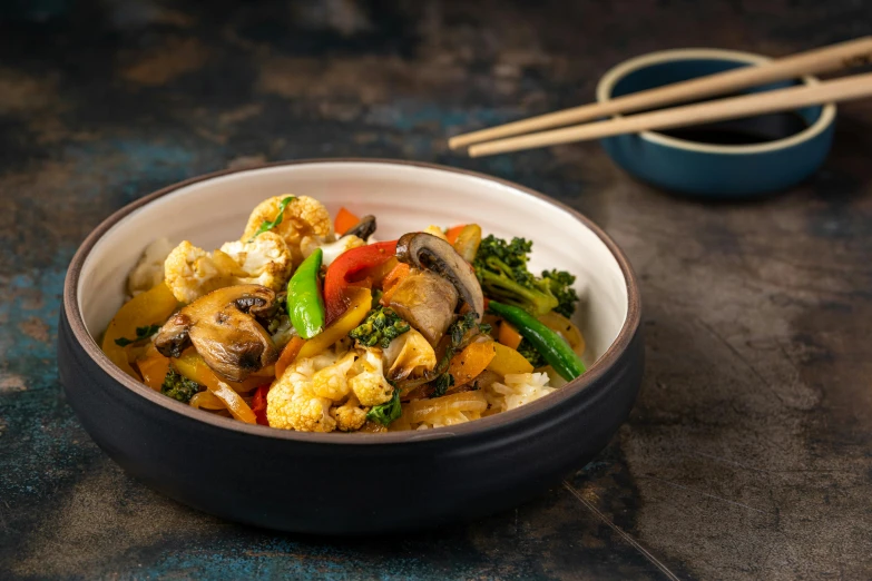 a close up of a bowl of food with chopsticks, vegetables, square, background image, fantasy medium shot