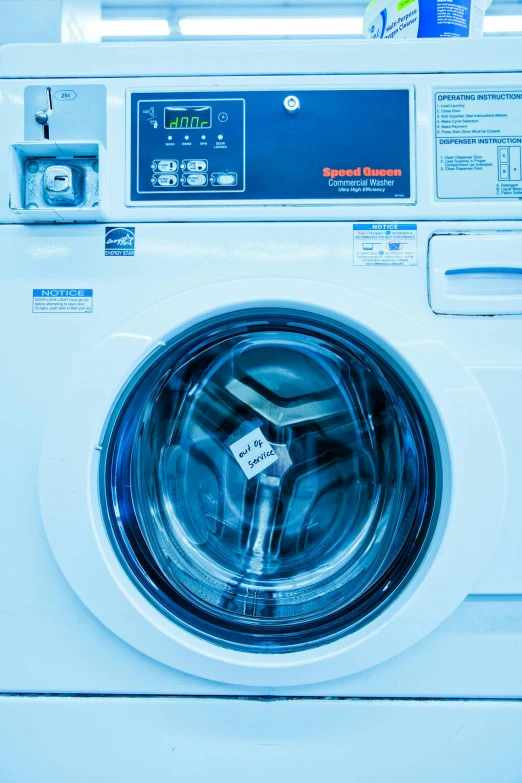 a close up of a washing machine in a room, inspired by Elsa Bleda, unsplash, process art, sky blue, clean medical environment, profile image, serious business