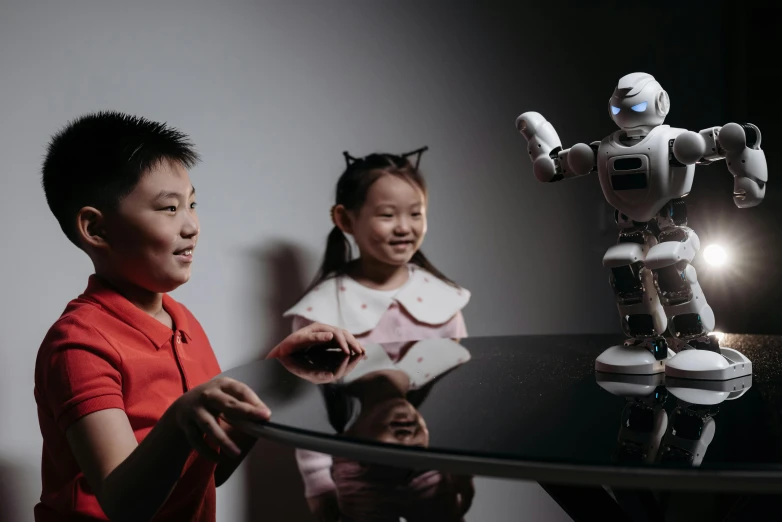 a boy and a girl playing with a robot, a portrait, pexels contest winner, zeen chin and farel dalrymple, jordan grimmer and natasha tan, portrait of an ai, 15081959 21121991 01012000 4k