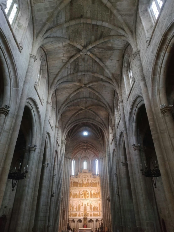 a group of people standing inside of a cathedral, inspired by Károly Markó the Elder, pexels contest winner, romanesque, arrendajo in avila pinewood, view from bottom to top, archs and walls, gif
