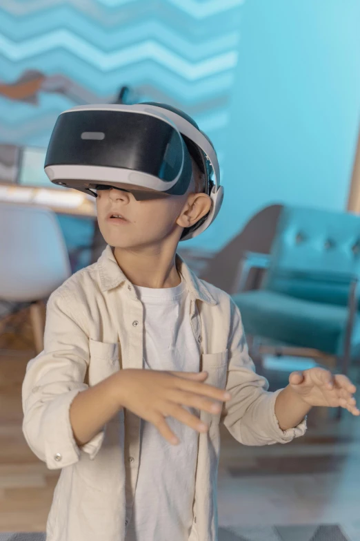 a little boy wearing a virtual reality headset, a hologram, pexels, interactive art, waving, architect, in year 3000, avatar image