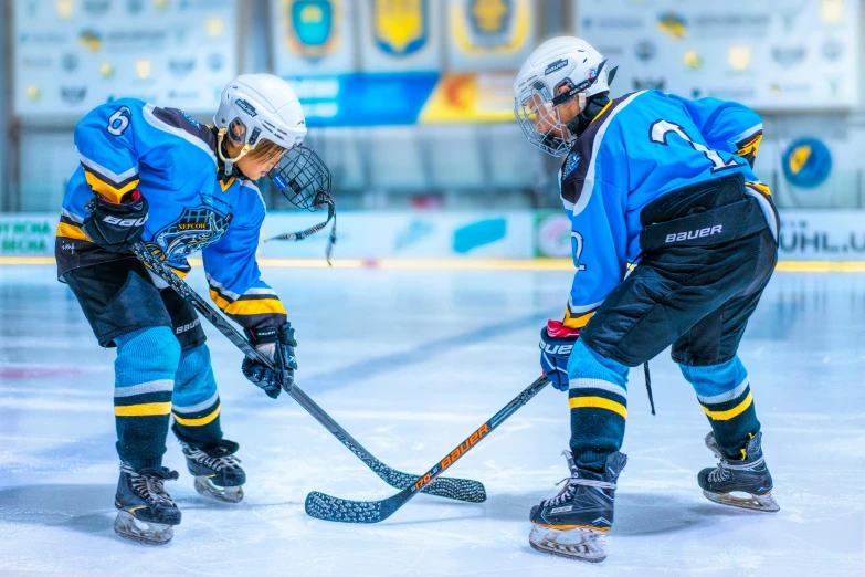 two young men playing a game of ice hockey, pexels contest winner, blue theme and yellow accents, cute girls, avatar image, schools