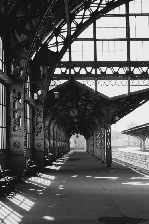 a black and white photo of a train station, by Albert Keller, art nouveau, medium format. soft light, porches, hannover, kano)