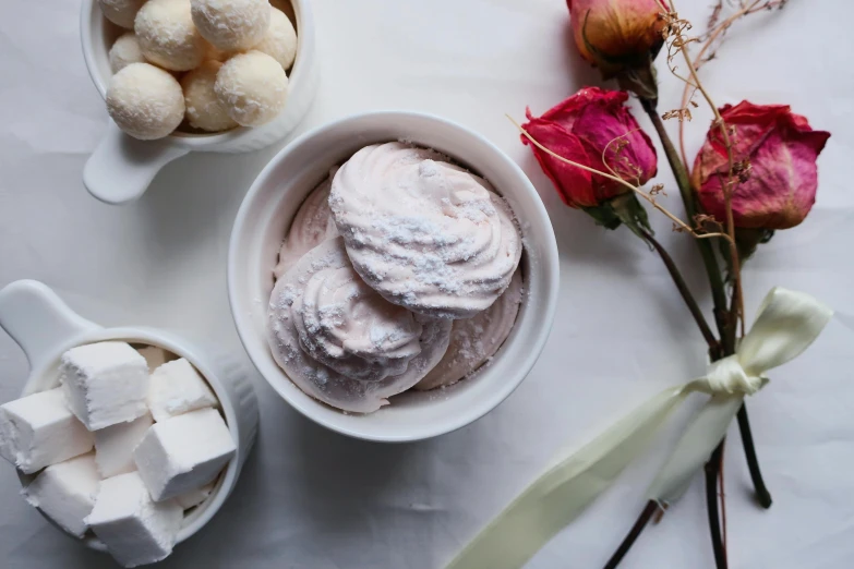 a bowl of marshmallows next to a bowl of marshmallows, inspired by Ödön Márffy, rococo, natural point rose', infused with a dream, pastry, thumbnail