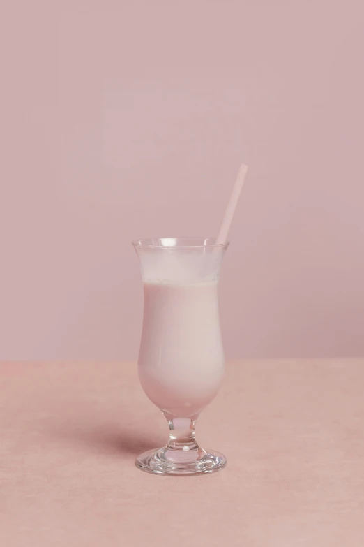 a glass of milk sitting on top of a table, pastel pink skin tone, with a straw, profile image, glassware