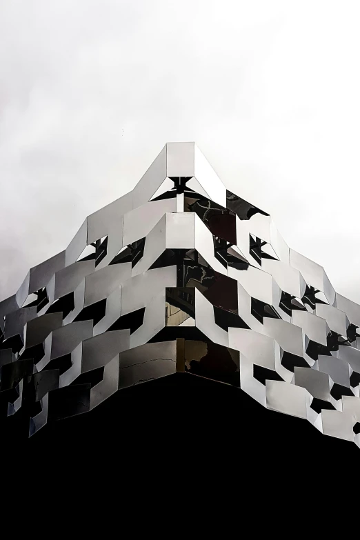 a black and white photo of a building, inspired by Zha Shibiao, unsplash, intricate chrome headdress, felipe pantone, angular metal, stainless steel