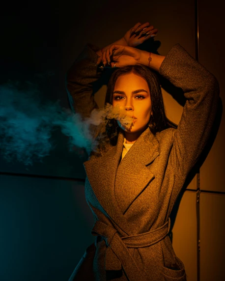 a woman in a coat smoking a cigarette, an album cover, inspired by Elsa Bleda, trending on pexels, nightlife, instagram model, smokey room, intimidating pose