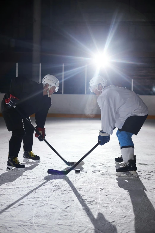 a couple of people playing a game of hockey, high lights, no - text no - logo, promo, trending