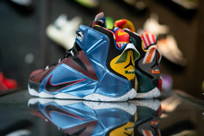a pair of shoes sitting on top of a glass table, by Washington Allston, pexels, toyism, lebron james, middle close up, looking from side, zig zag