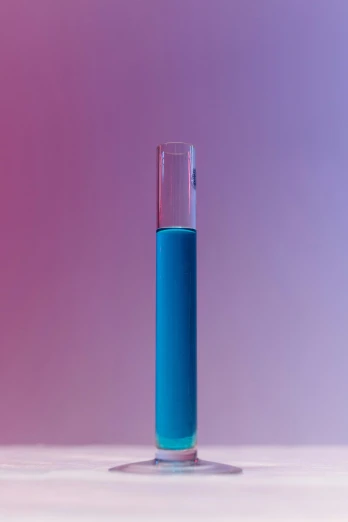a glass filled with blue liquid sitting on top of a table, unsplash, conceptual art, purple tubes, pathology sample test tubes, blue and pink color scheme, full of glass. cgsociety