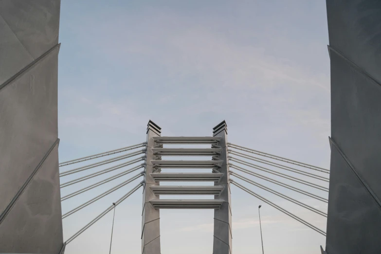 a group of people walking across a bridge, an album cover, by Jacob Toorenvliet, pexels contest winner, postminimalism, detailed structures, pylons, front face, helsinki