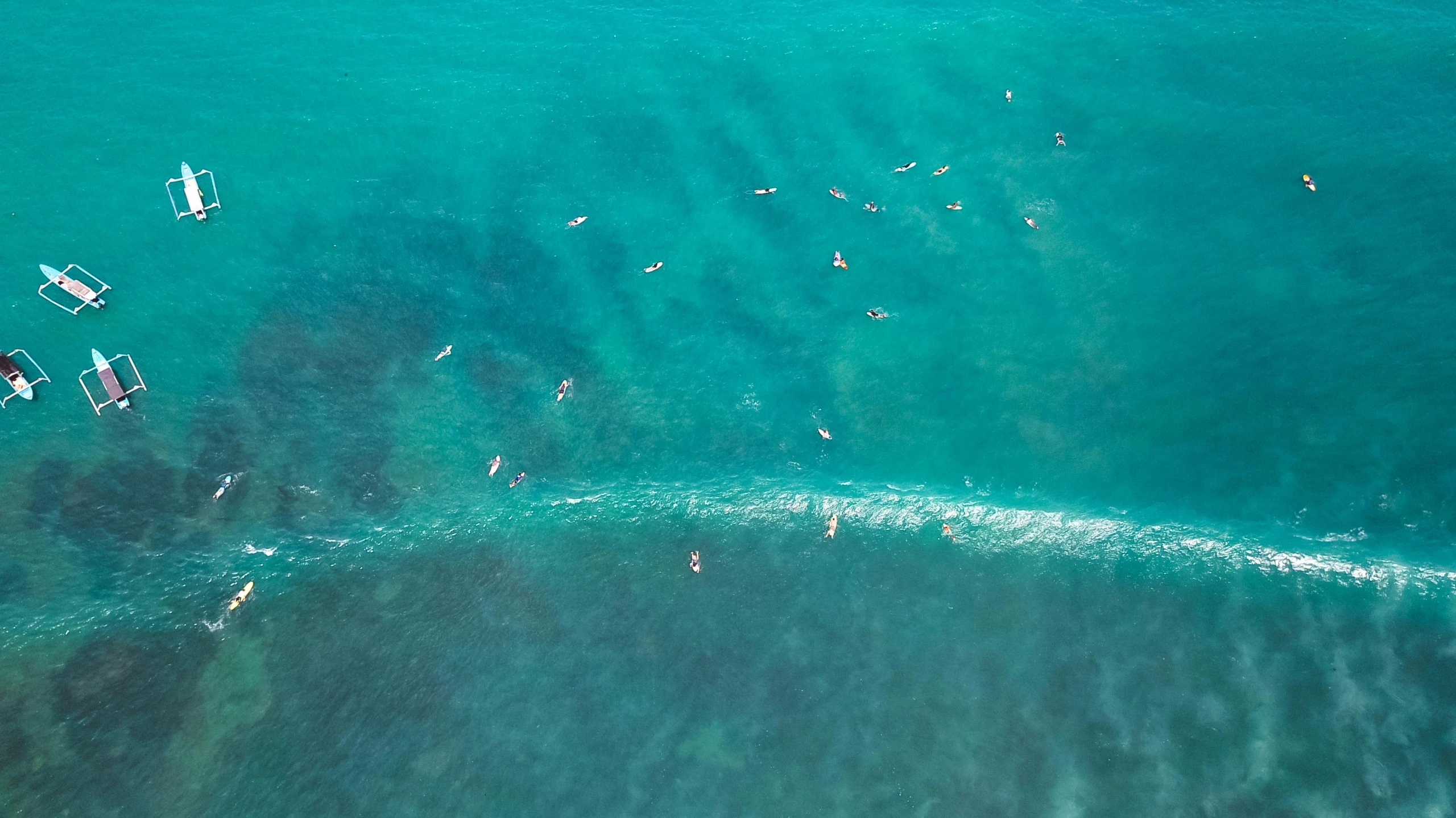 a group of people swimming in the ocean, by Carey Morris, pexels contest winner, turquoise palette, surfing, in a row, birdeye