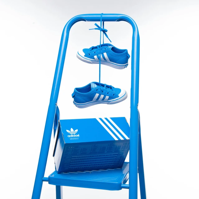 a blue ladder with three pairs of shoes on it, by Niels Lergaard, adidas, replica model, product studio lighting, childish