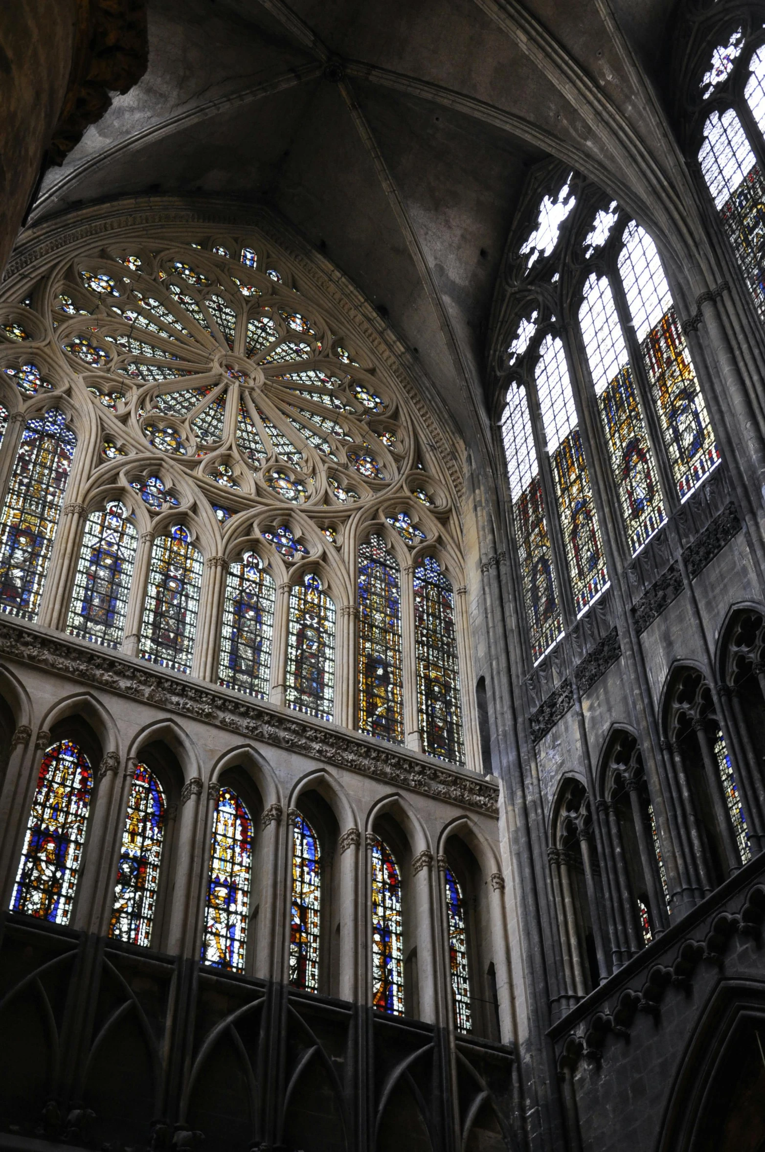 the inside of a cathedral with stained glass windows, inspired by Villard de Honnecourt, gothic art, grey, gothic rich deep colors, colorful caparisons, alabaster gothic cathedral