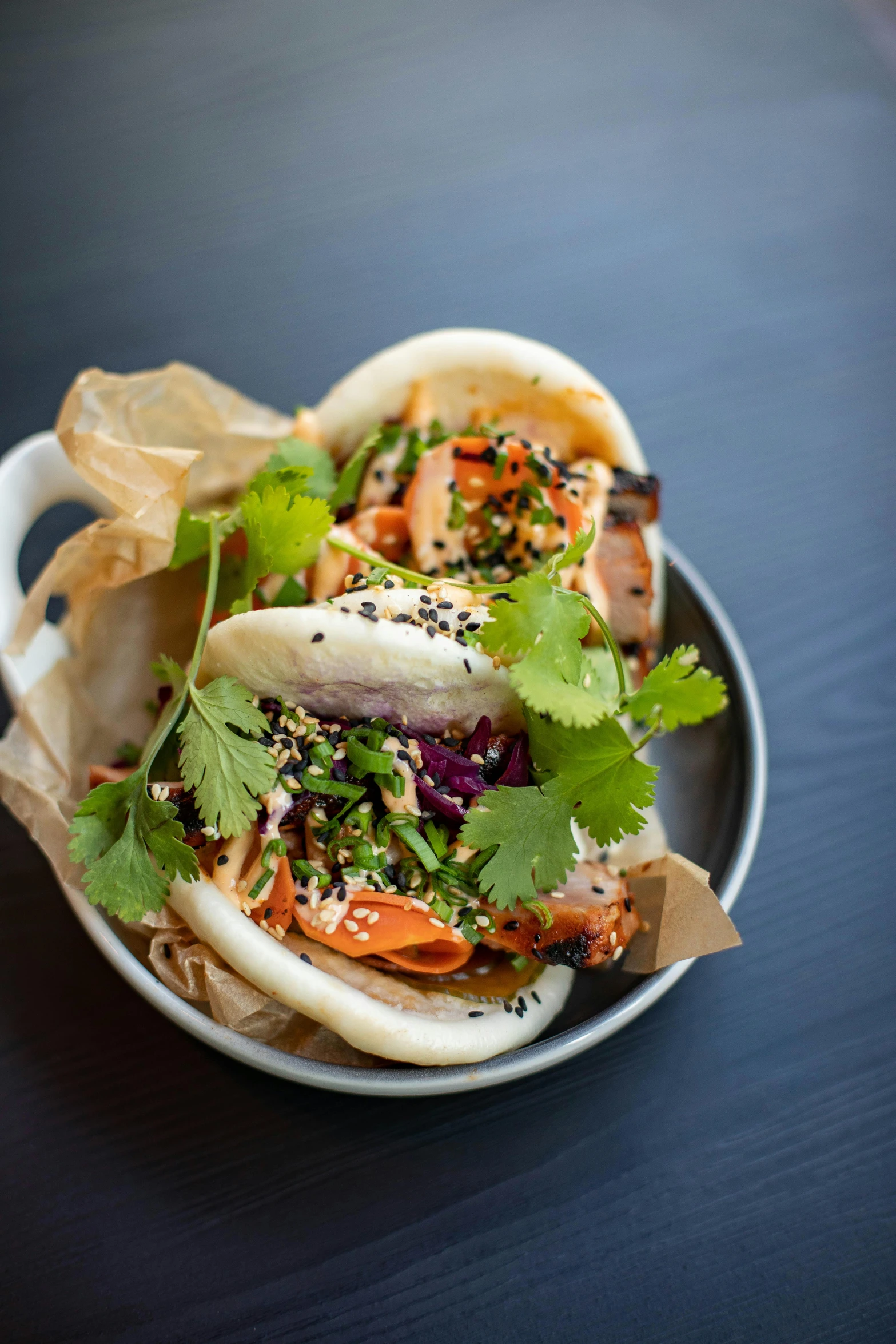 a close up of a plate of food on a table, bao pham, far view, daytime, units