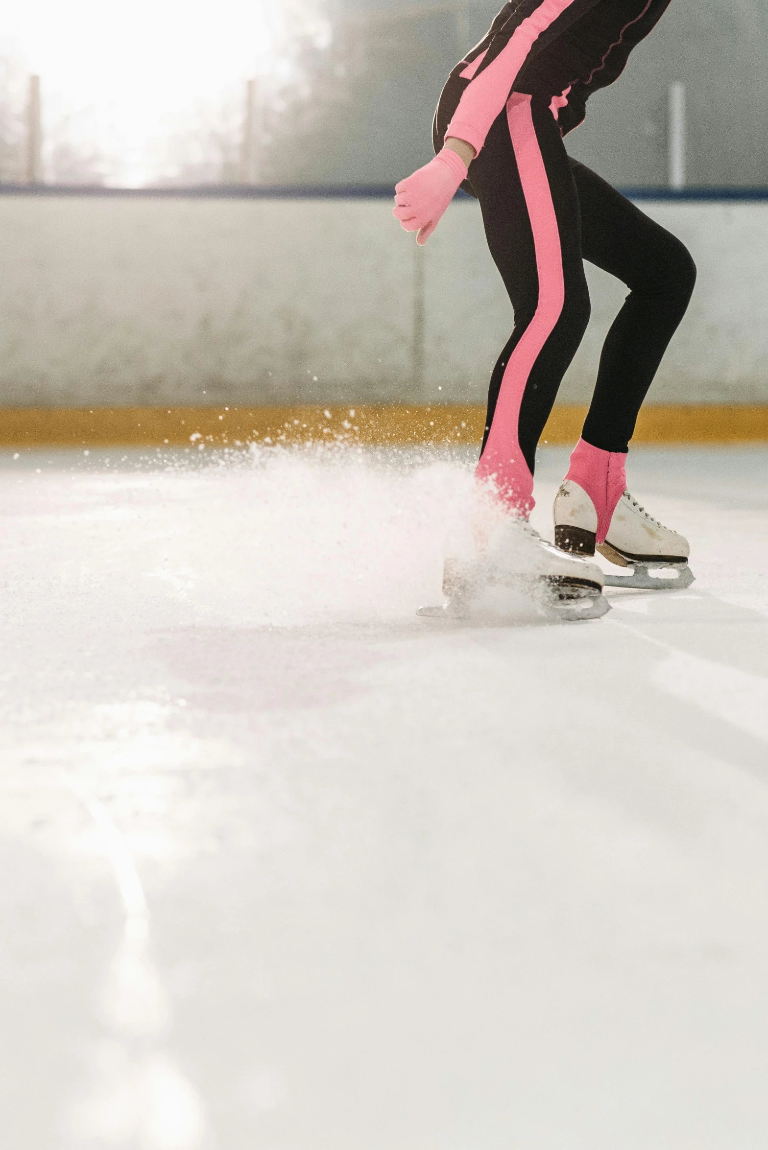 a female figure skating on an ice rink, trending on pexels, process art, smooth clean texture, pink, thumbnail, dry ice