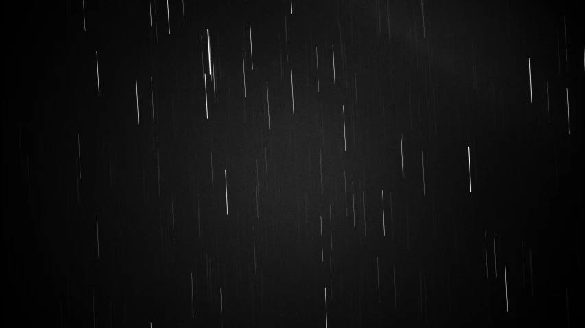 a black and white photo of rain in the night, by Ryoji Ikeda, unsplash, minimalism, meteor shower, amoled wallpaper, vertical lines, iphone screenshot