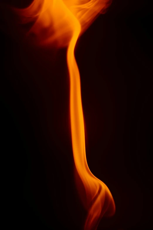 a close up of a lit candle in the dark, by Jan Rustem, art photography, flowing lava, long tail, new mexico, f/8