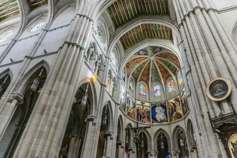 the interior of a cathedral with stained glass windows, a picture, by Karel Dujardin, pexels contest winner, art nouveau, madrid, 2 5 6 x 2 5 6 pixels, grey, wide high angle view