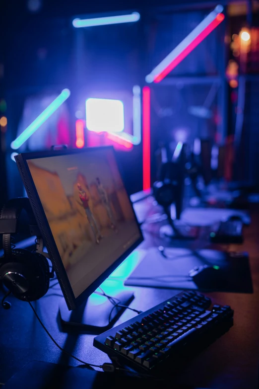 a desktop computer sitting on top of a wooden desk, by Dan Content, pexels, blue and orange rim lights, games, with screens and silks, server in the middle