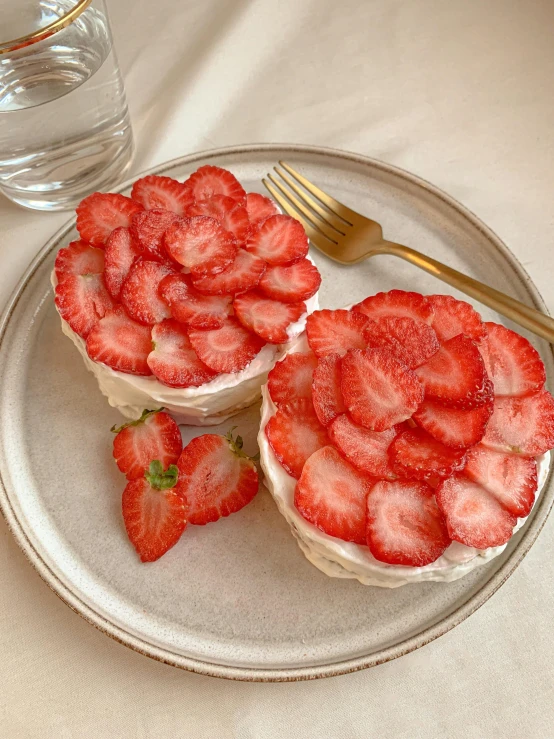 a close up of a plate of food with strawberries, cutecore, two organic looking towers, beautiful natural soft rim light, 🚿🗝📝