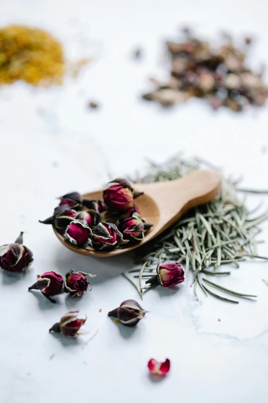 a wooden spoon filled with dried flowers and herbs, photo of a rose, epicurious, professional grade, lulu chen