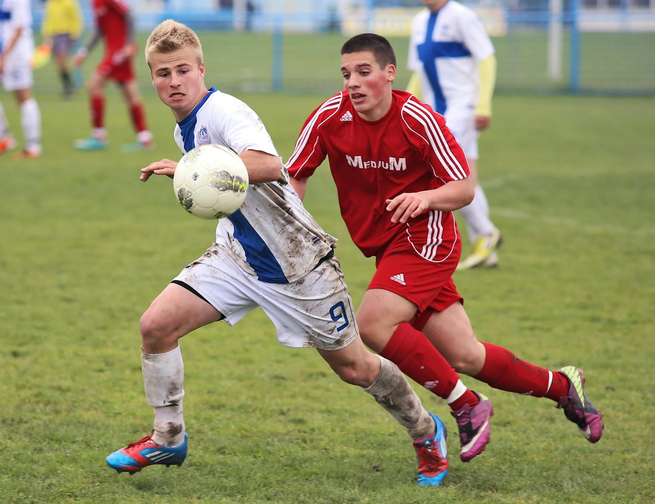 a couple of young men playing a game of soccer, lynn skordal, racing, valeriy vegera, tournament