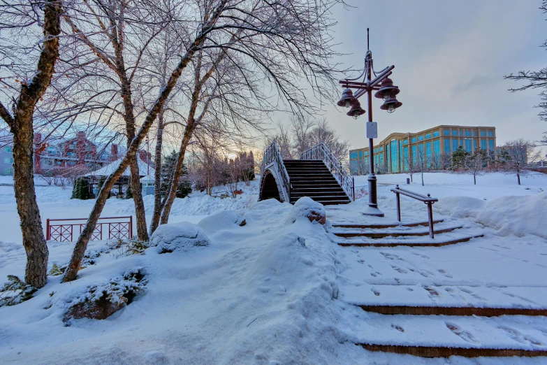 there is a lot of snow on the ground, inspired by Vasily Surikov, pexels contest winner, penrose stairs, village square, thumbnail, high dynamic range color