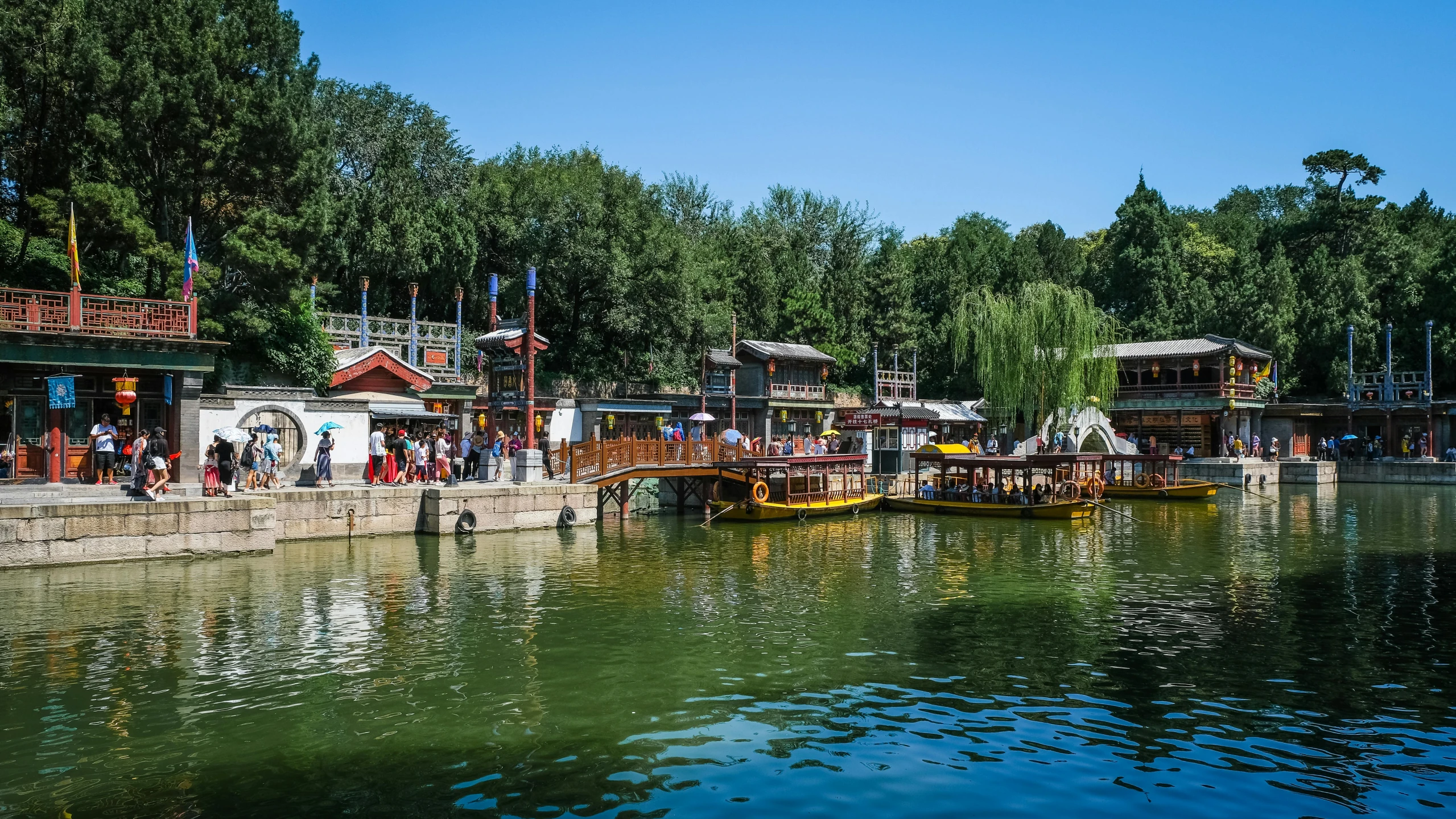 a number of boats in a body of water, by Julia Pishtar, pexels contest winner, mingei, beijing, avatar image, square, parks and public space