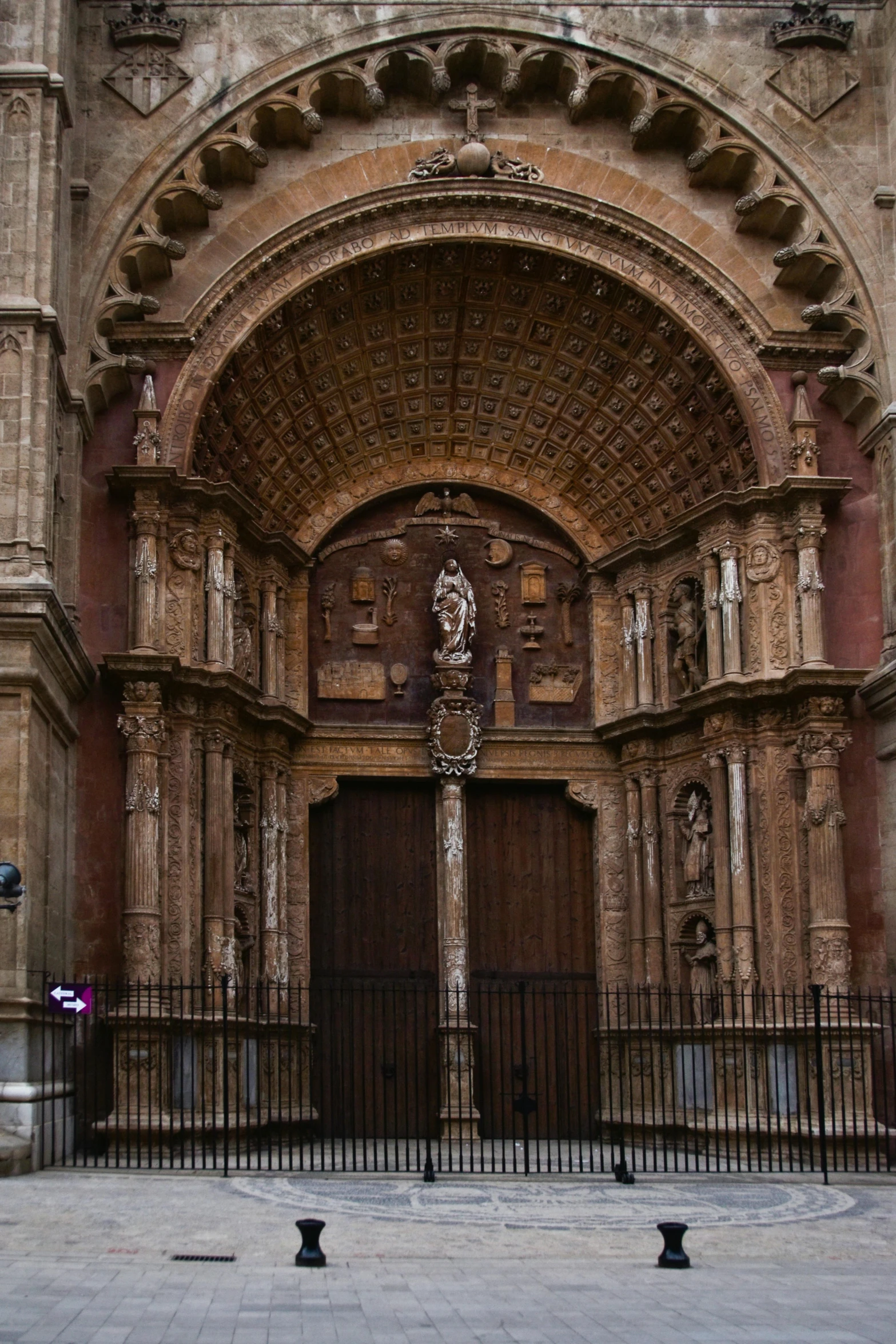 a large building with a clock on the front of it, inspired by Luis Paret y Alcazar, baroque, doorway, cathedral, archs, rip