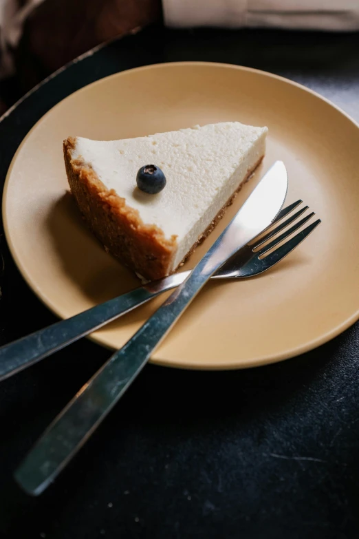 a slice of cheesecake on a plate with a fork, unsplash, golden ration, navy, thumbnail, premium