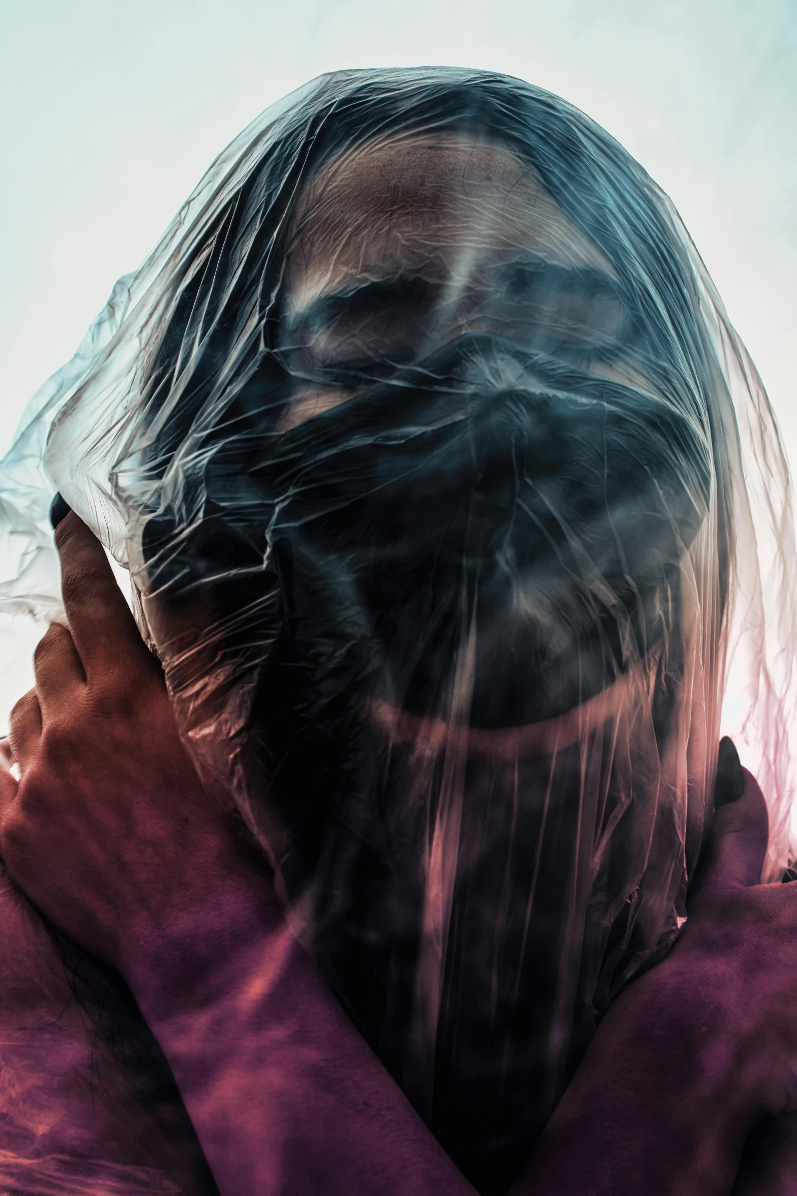 a woman covering her face with a plastic bag, poster art, by Adam Marczyński, pexels contest winner, fractal hair, closeup of sweating forehead, aura jared and wires, split dye