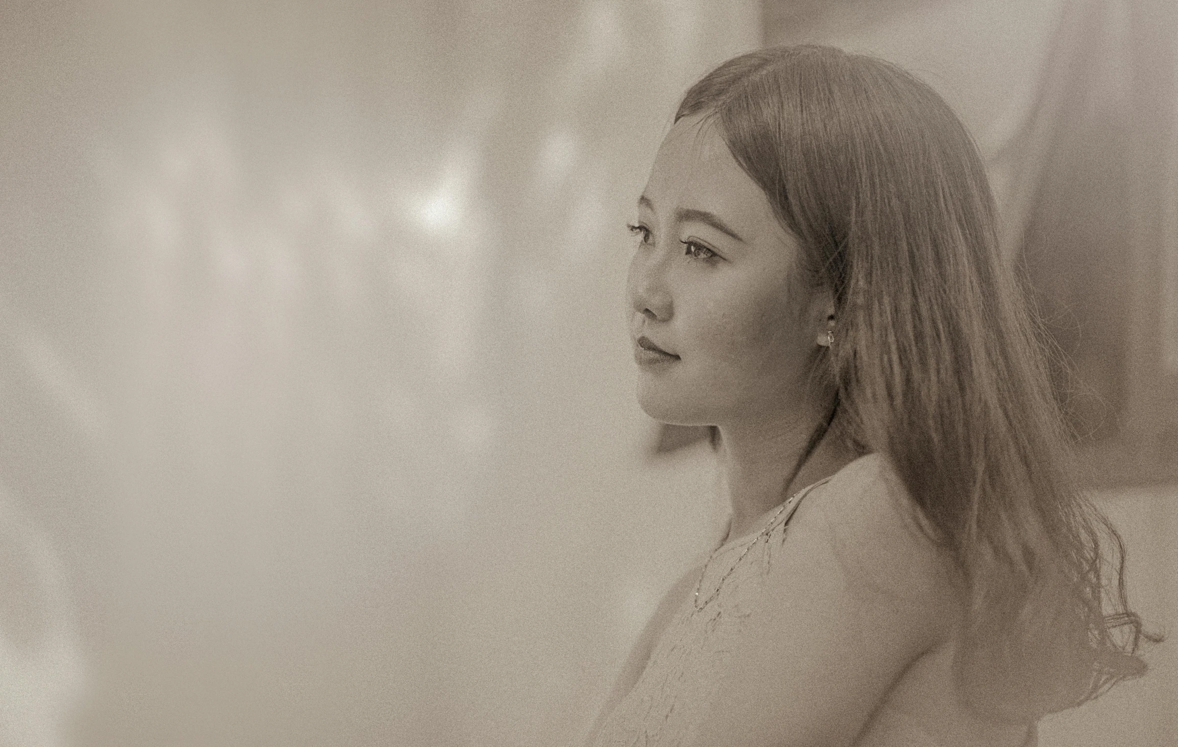 a black and white photo of a woman with long hair, inspired by Kim Tschang Yeul, pexels contest winner, realism, delicate soft hazy lighting, yanjun chengt, soft light.4k, panoramic view of girl