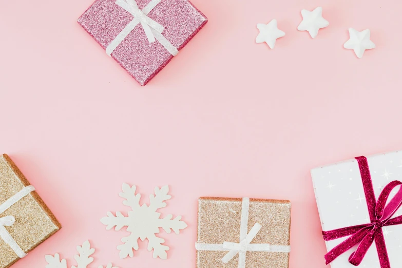 gift boxes with bows and snowflakes on a pink background, by Eden Box, pexels contest winner, hurufiyya, background image, square, sephora