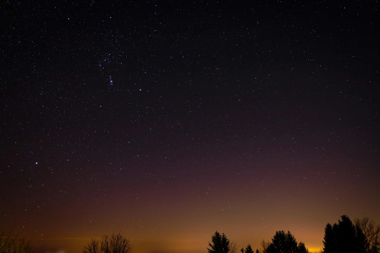 a night sky filled with lots of stars, unsplash, renaissance, 3 / 4 wide shot, brown, violet sky, 2022 photograph