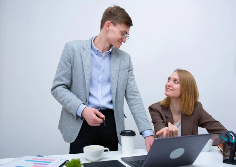 a man and a woman standing in front of a laptop, on a white table, avatar image, фото девушка курит, professional profile photo