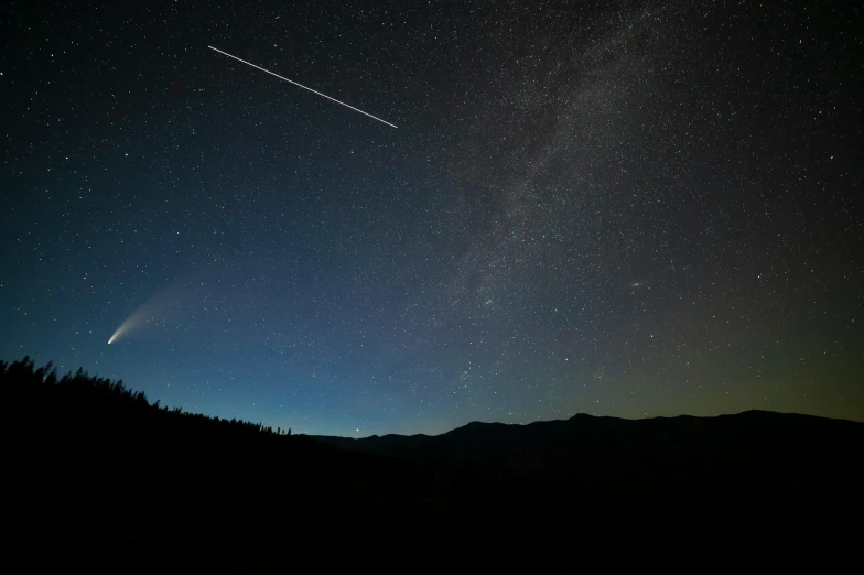 a plane is flying through the night sky, by Niko Henrichon, unsplash contest winner, space art, new hampshire, meteors, late summer evening, space station vore station