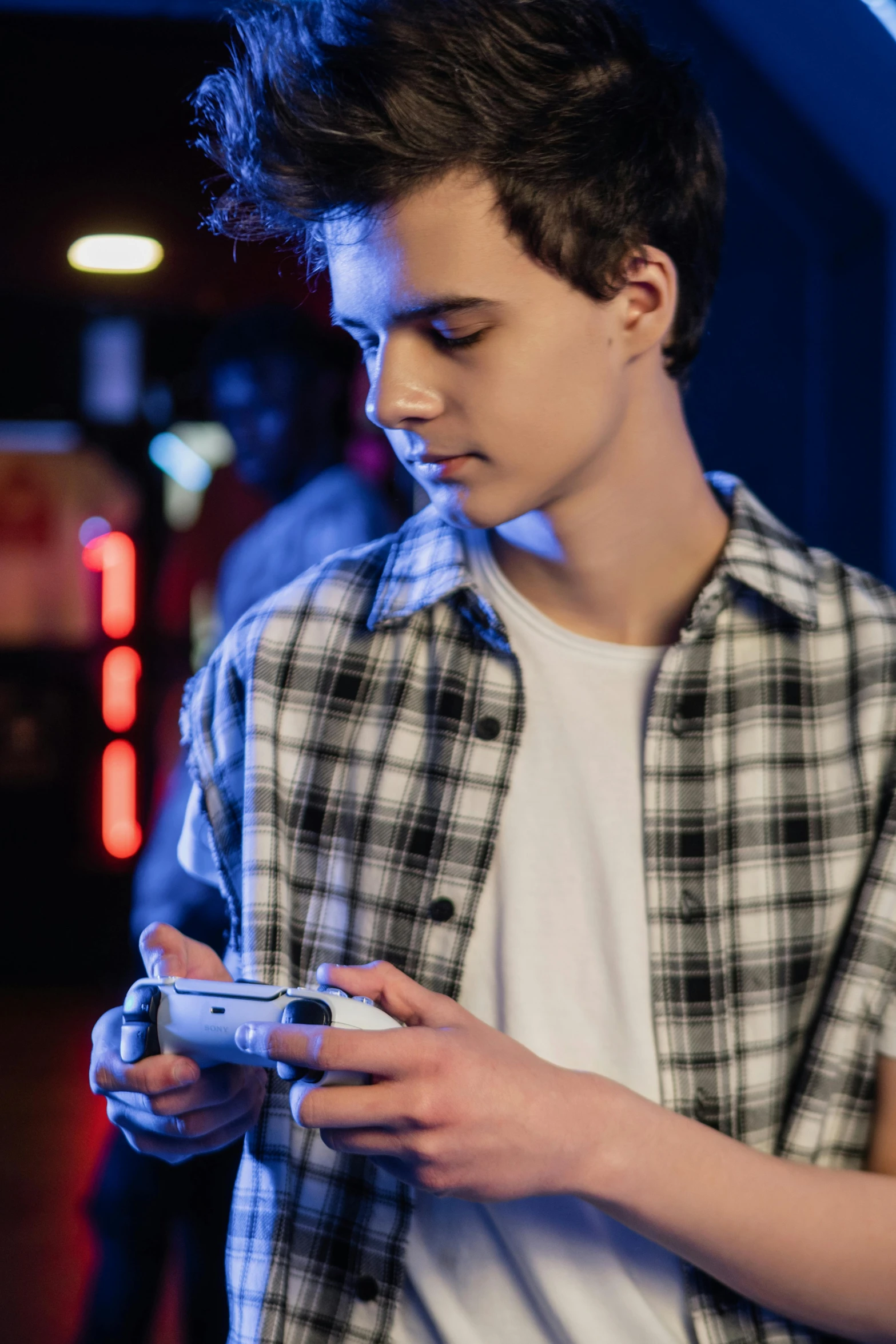 a young man looking at his cell phone, trending on pexels, video game character, ✨🕌🌙, hyperrealistic teen, 15081959 21121991 01012000 4k
