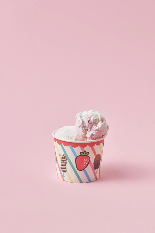 a cup of ice cream on a pink background, strawberry fields forever, paper cup, multicoloured, f / 2 0